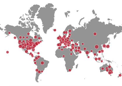 A global map with red dots indicating collaborations around the world
