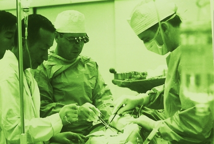Historic photo of doctors in an operating room
